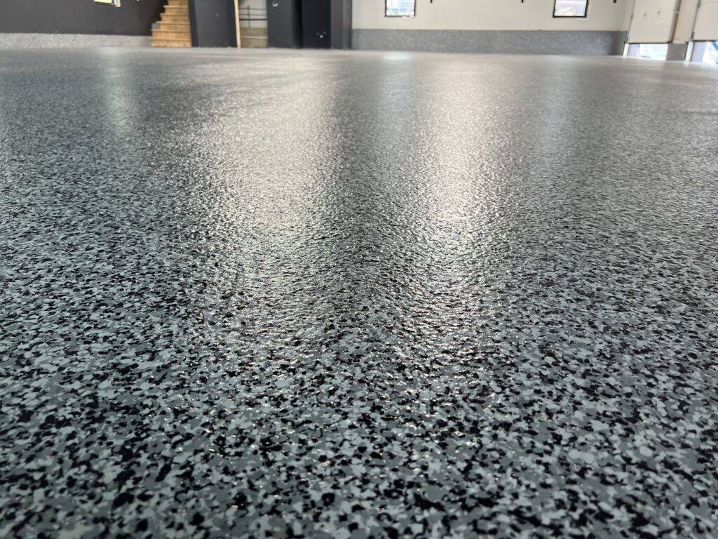 Close-up of a decorative flake epoxy floor finish